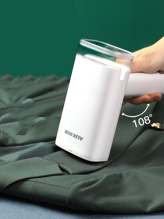 Handheld steam ironing machine