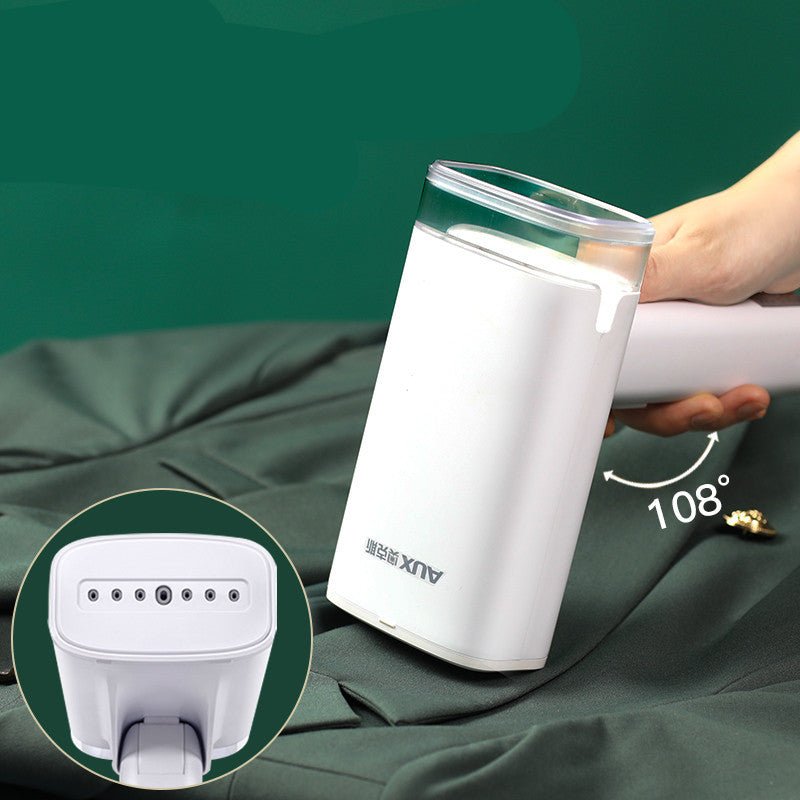 Handheld steam ironing machine