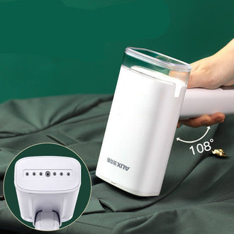 Handheld steam ironing machine