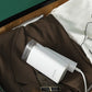 Handheld steam ironing machine