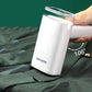 Handheld steam ironing machine
