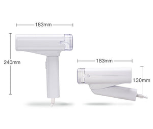 Handheld steam ironing machine